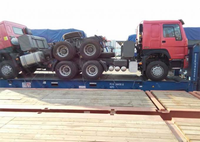 HOWOのトラクターのトラックは平らな棚によってタンザニアに渡す